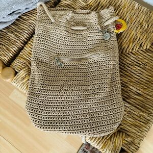 The Sak crochet drawstring backpack with zip pocket